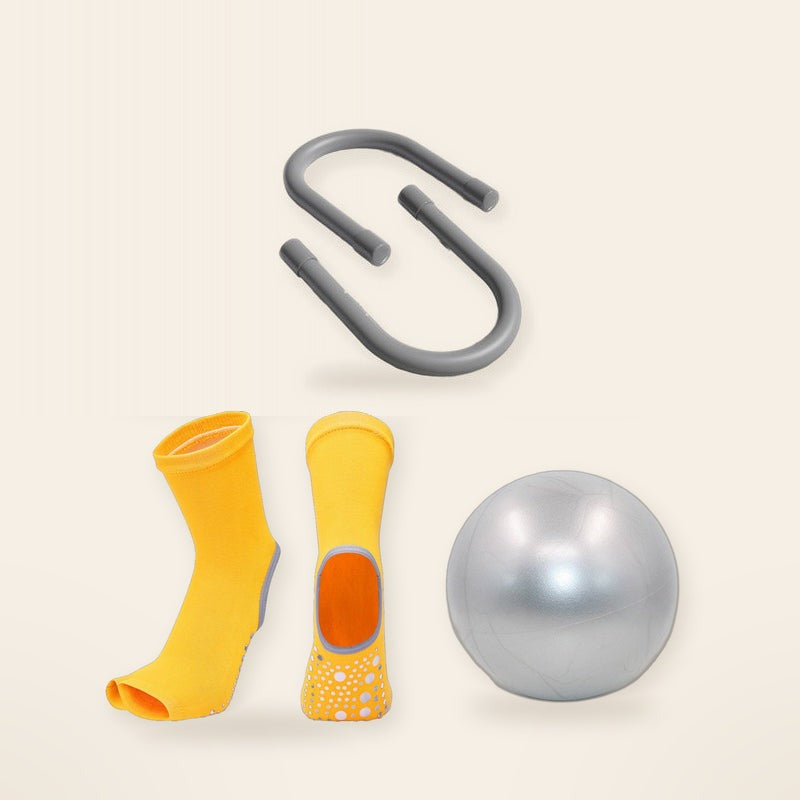 Studio Starter Kit in Yellow: grip socks, mini Pilates ball and wrist & ankle weights